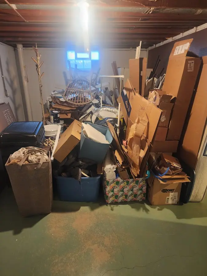 Roll-off dumpster container at job site for 8 Yard Dumpster Rental in St. John